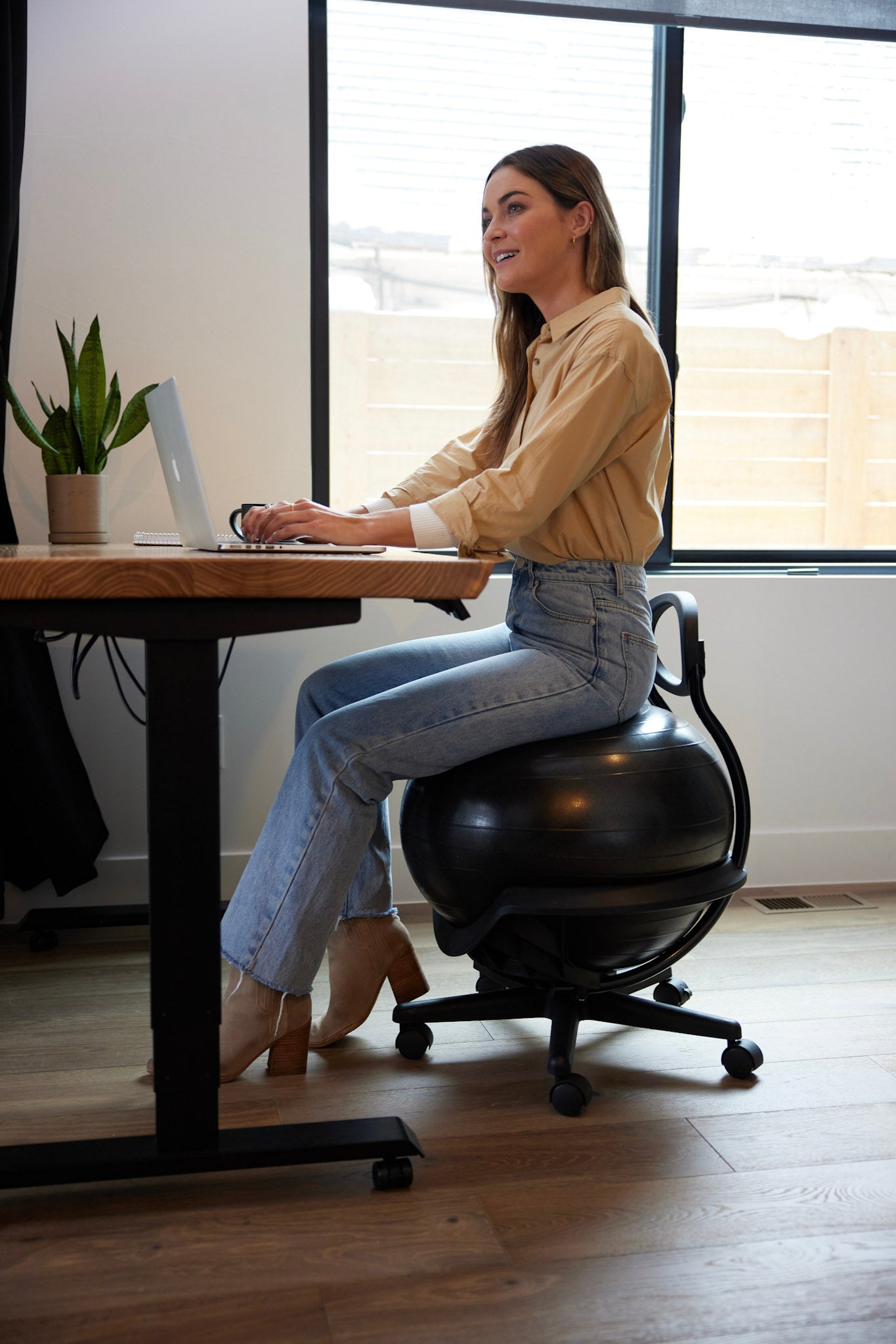 Woman sitting on Ultimate Balance Ball Chair